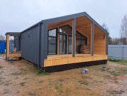 Одноэтажный дом с террасой в стиле "Барнхаус"