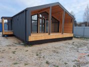 Одноэтажный дом с террасой в стиле "Барнхаус"